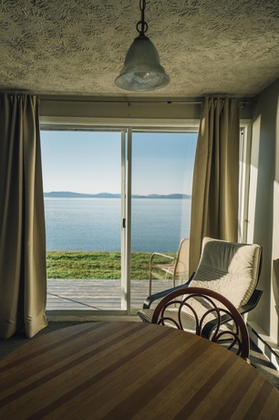Imagen de la habitación del Hotel Auberge Sur Mer. Foto 11