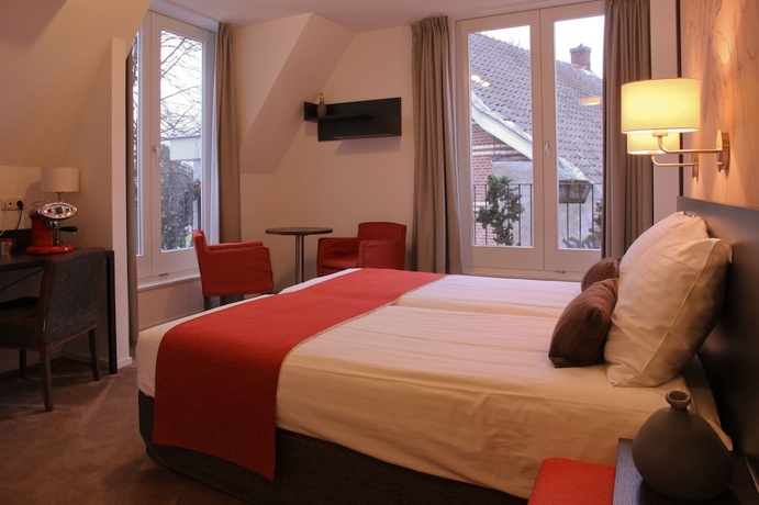 Imagen de la habitación del Hotel Auberge Vincent. Foto 2