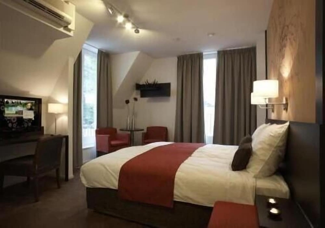 Imagen de la habitación del Hotel Auberge Vincent. Foto 13