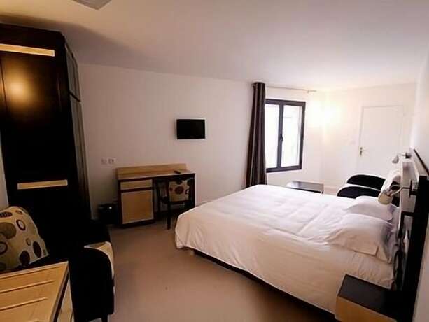 Imagen de la habitación del Hotel Auberge de la Xaintrie. Foto 16