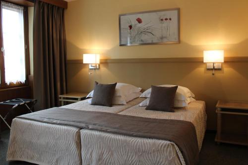 Imagen de la habitación del Hotel Auberge des Trois Ch&acirc;teaux. Foto 5