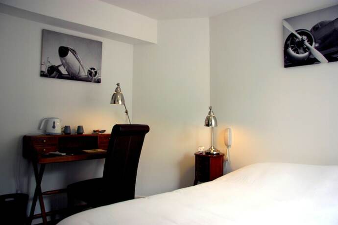 Imagen de la habitación del Hotel Auberge du Cheval Blanc, Park Pin. Foto 19