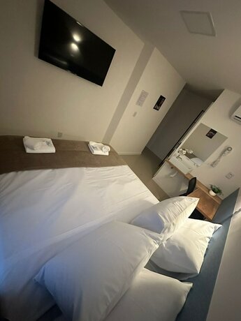 Imagen de la habitación del Hotel Audaar Tech Su&iacute;tes. Foto 19