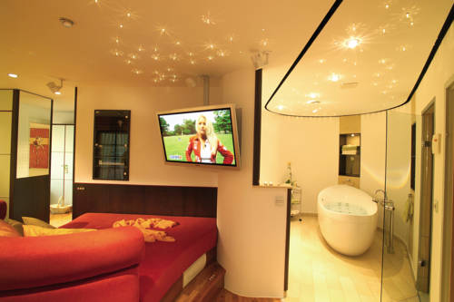 Imagen de la habitación del Hotel Auerhahn Wellnesshotel. Foto 11