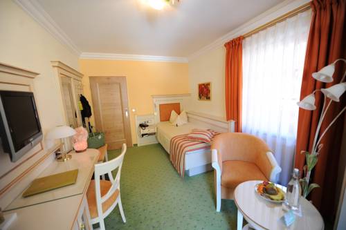 Imagen de la habitación del Hotel Auerhahn Wellnesshotel. Foto 13