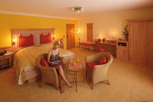 Imagen de la habitación del Hotel Auerhahn Wellnesshotel. Foto 15