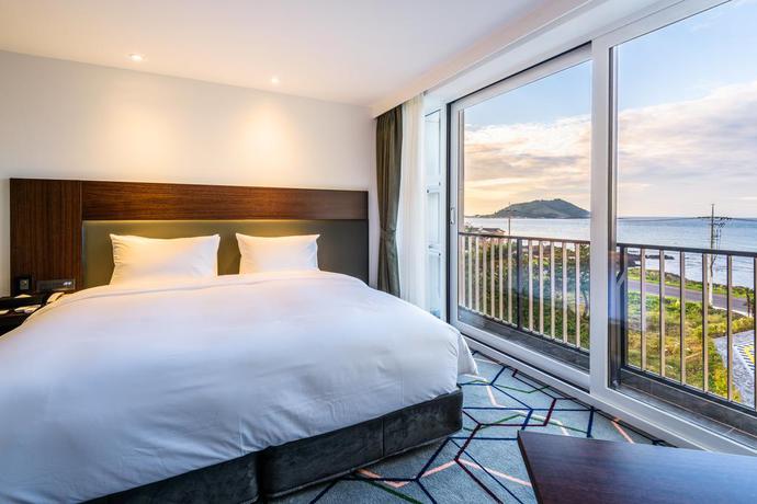 Imagen de la habitación del Hotel Augila Jeju Oceano Suites. Foto 3