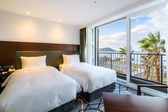 Imagen de la habitación del Hotel Augila Jeju Oceano Suites. Foto 4