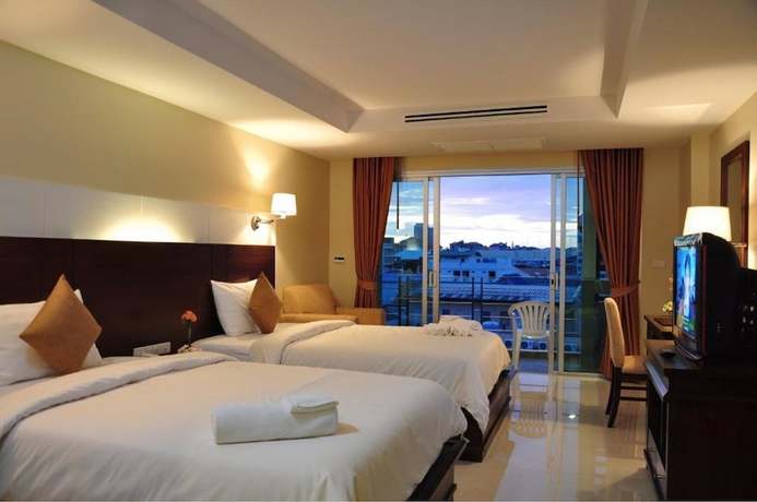Imagen de la habitación del Hotel August Suites. Foto 2