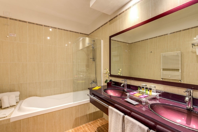 Imagen de la habitación del Hotel Augusta Lucilla Palace. Foto 6