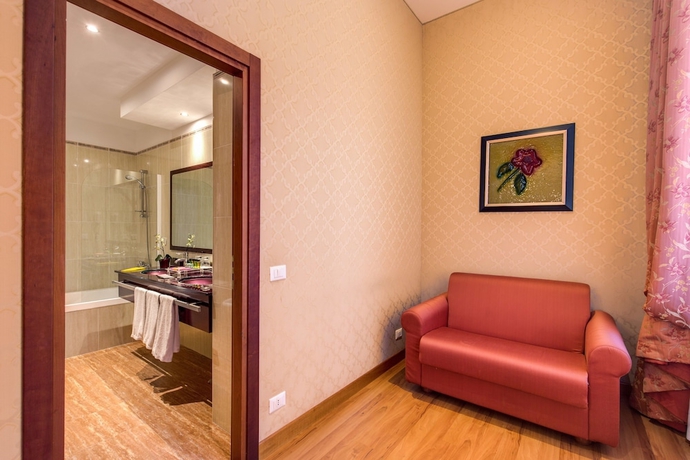 Imagen de la habitación del Hotel Augusta Lucilla Palace. Foto 7