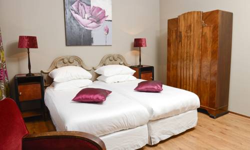 Imagen de la habitación del Hotel Augusta and Restaurant. Foto 13
