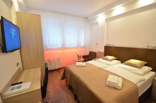 Imagen de la habitación del Hotel Aura Design & Garden Pool. Foto 10