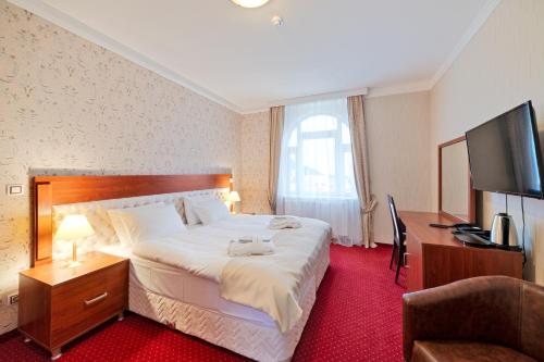 Imagen de la habitación del Hotel Aura, Marianske Lazne. Foto 14