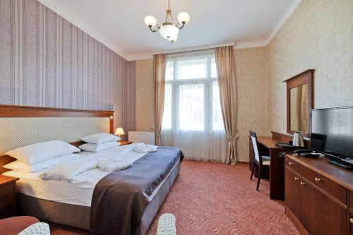 Imagen de la habitación del Hotel Aura, Marianske Lazne. Foto 16