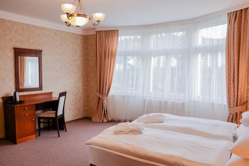 Imagen de la habitación del Hotel Aura, Marianske Lazne. Foto 18