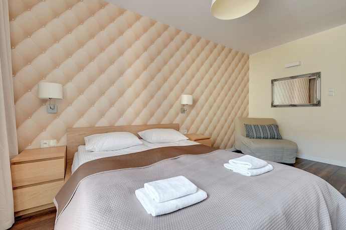 Imagen de la habitación del Hotel Aura by Downtown Apartments. Foto 18