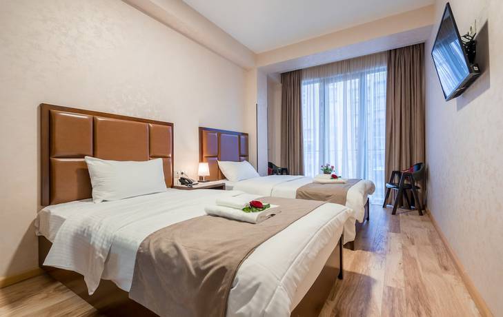 Imagen de la habitación del Hotel Aura in Digomi. Foto 17