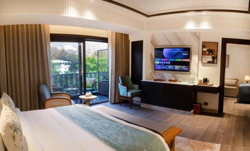 Imagen de la habitación del Hotel Auradoon, Dehradun - By Leisures. Foto 17