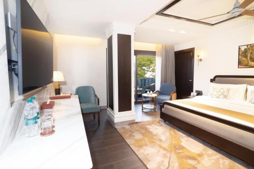 Imagen de la habitación del Hotel Auradoon, Dehradun - By Leisures. Foto 19