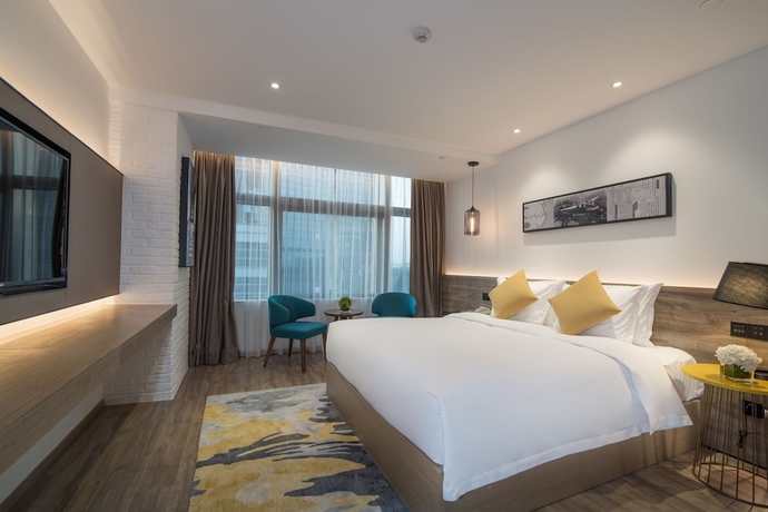 Imagen de la habitación del Hotel Auraya By Suning Nanjing Hexi. Foto 2