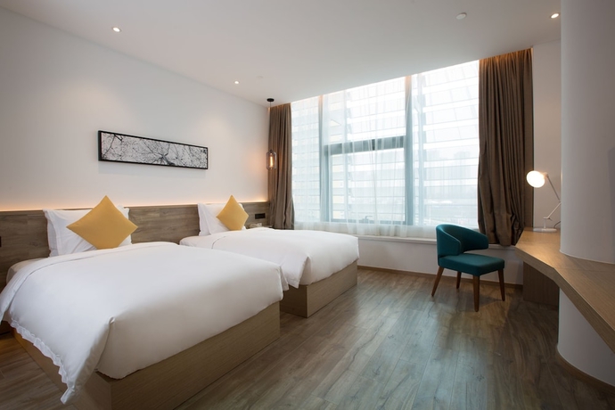 Imagen de la habitación del Hotel Auraya By Suning Nanjing Hexi. Foto 9