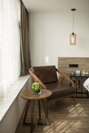 Imagen de la habitación del Hotel Auraya By Suning Nanjing Hexi. Foto 13