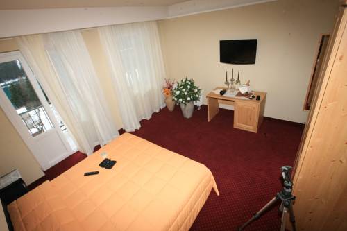 Imagen de la habitación del Hotel Auronzo Dolomites, Affiliated by Melia. Foto 16