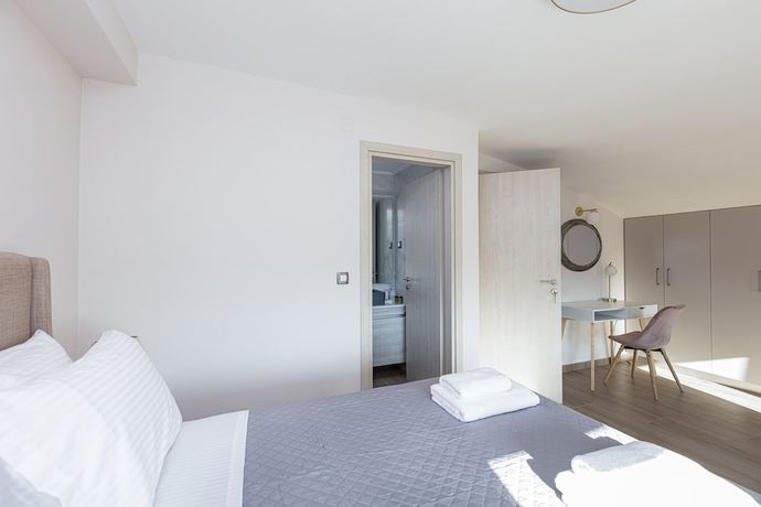 Imagen de la habitación del Hotel Aurora Apartments. Foto 18