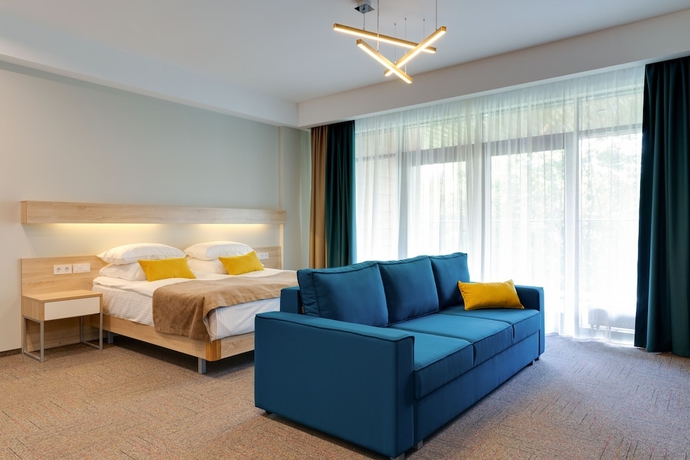 Imagen de la habitación del Hotel Aurora Club Spa Resort. Foto 5