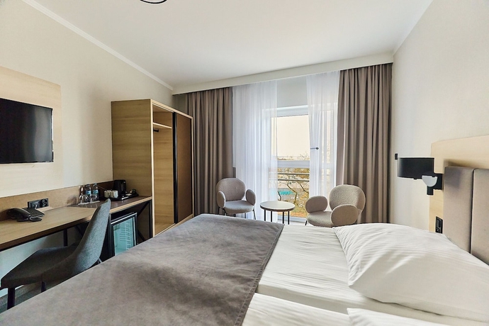 Imagen de la habitación del Hotel Aurora Family and Spa. Foto 14