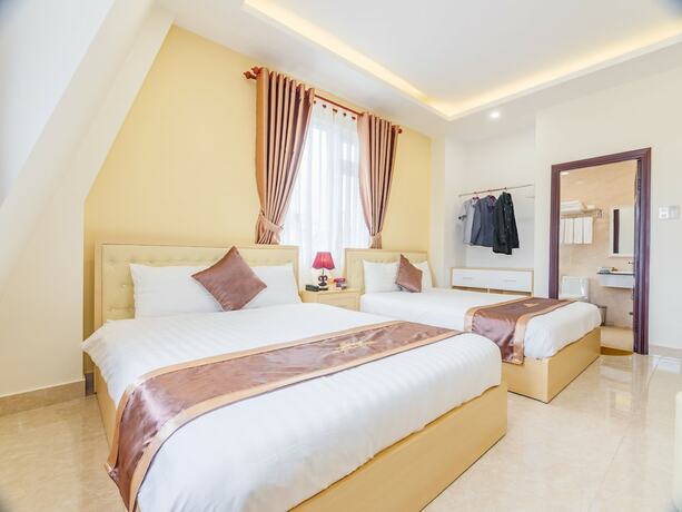 Imagen de la habitación del Hotel Aurora Hotel Dalat. Foto 3