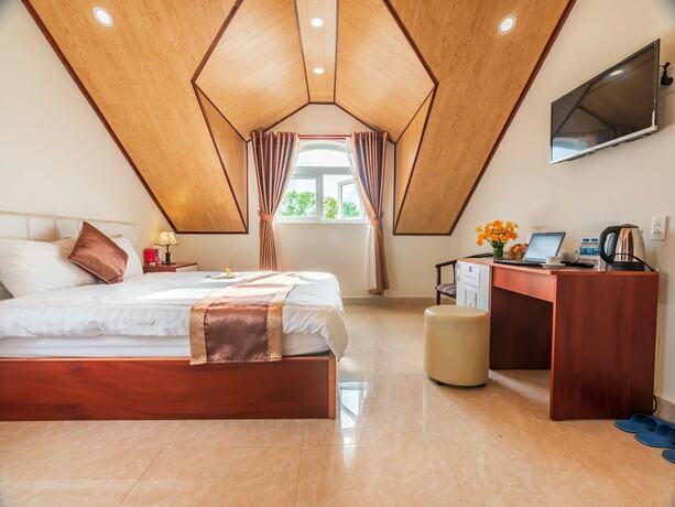 Imagen de la habitación del Hotel Aurora Hotel Dalat. Foto 8