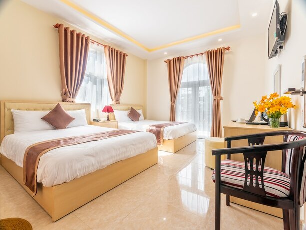 Imagen de la habitación del Hotel Aurora Hotel Dalat. Foto 9