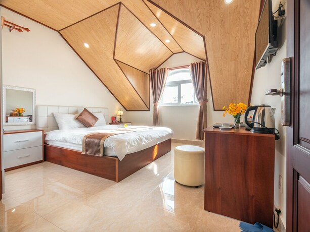 Imagen de la habitación del Hotel Aurora Hotel Dalat. Foto 12