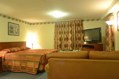 Imagen de la habitación del Hotel Aurora Park Inn & Suites. Foto 2