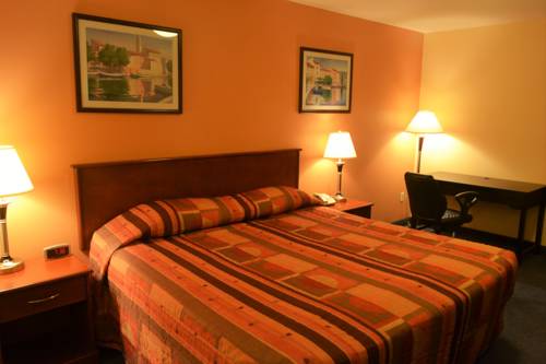 Imagen de la habitación del Hotel Aurora Park Inn & Suites. Foto 4
