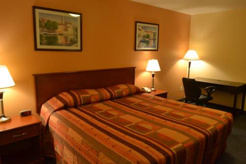 Imagen de la habitación del Hotel Aurora Park Inn & Suites. Foto 9
