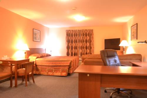 Imagen de la habitación del Hotel Aurora Park Inn & Suites. Foto 11