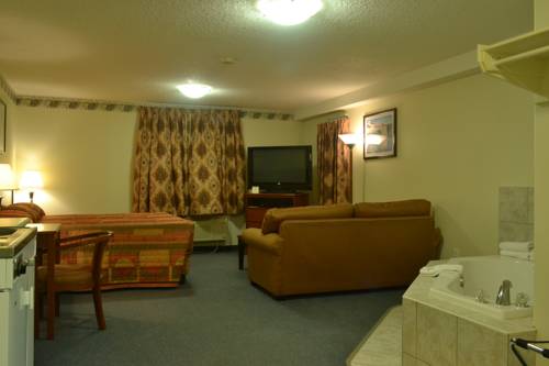 Imagen de la habitación del Hotel Aurora Park Inn & Suites. Foto 12