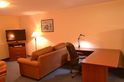 Imagen de la habitación del Hotel Aurora Park Inn & Suites. Foto 14