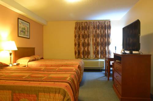 Imagen de la habitación del Hotel Aurora Park Inn & Suites. Foto 15