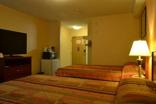 Imagen de la habitación del Hotel Aurora Park Inn & Suites. Foto 16