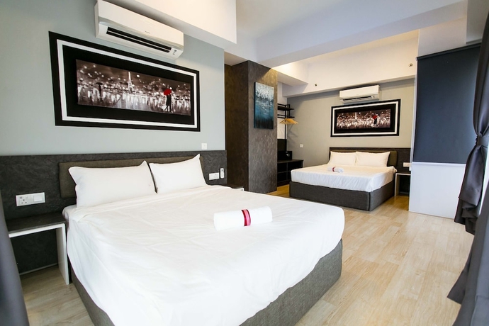 Imagen de la habitación del Hotel Aurora Pavilion Bukit Jalil by Ody Suites. Foto 2