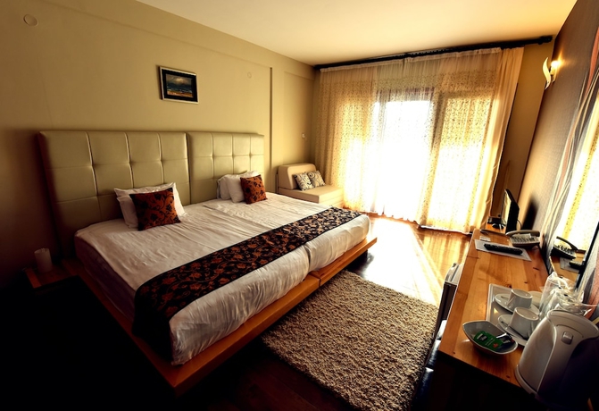 Imagen de la habitación del Hotel Aurora Resort and Spa. Foto 5