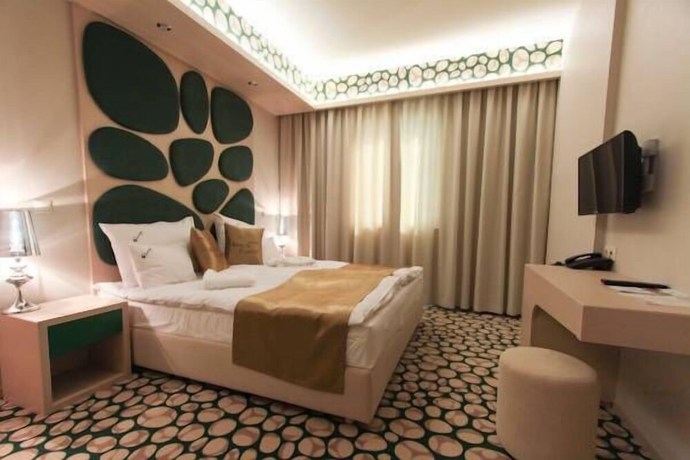 Imagen de la habitación del Hotel Aurum Family. Foto 12