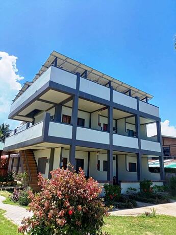 Imagen de la habitación del Hotel Ausan Beach Front Cottage and Restaurant. Foto 18