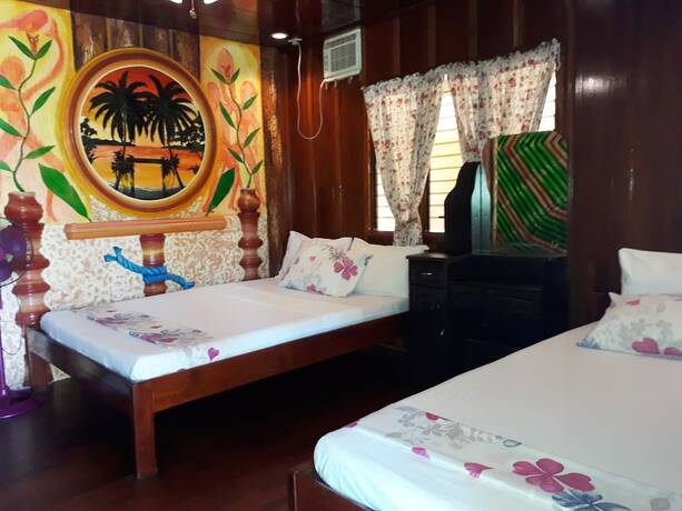 Imagen general del Hotel Ausan Beach Front Cottage and Restaurant. Foto 10