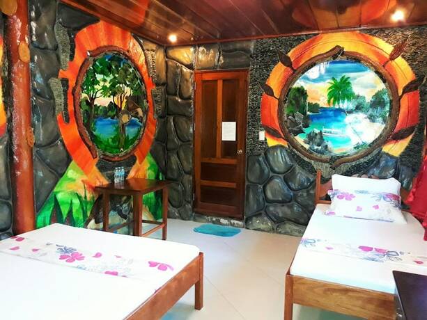 Imagen general del Hotel Ausan Beach Front Cottage and Restaurant. Foto 15