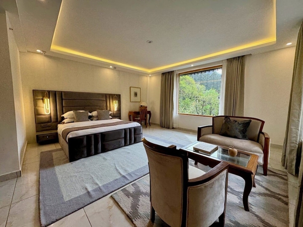 Imagen de la habitación del Hotel Ausnya Tirthan. Foto 7